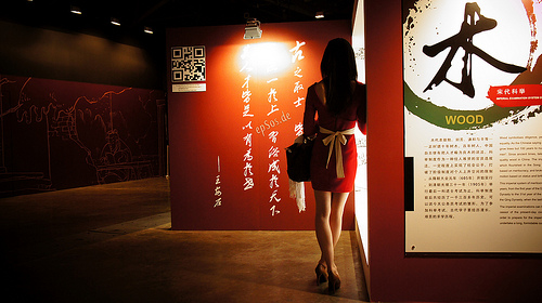 Beautiful woman with long legs in red dress by epSos on Flickr